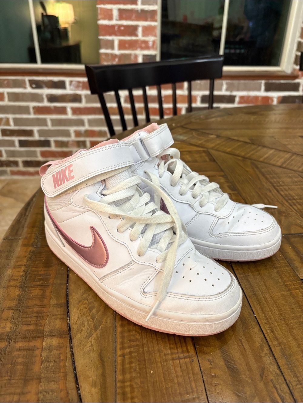 Nike White and Pink Mid-Top Sneakers with Metallic Swoosh